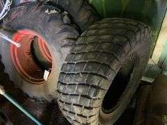2 Loaded tires on rims and one tire 14.9-24
