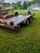 Dual axle flat bed trailer