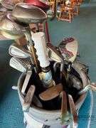 2 sets of rental clubs with bags
