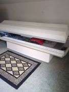 Tanning bed - Located upstairs. Buyer must bring help and responsible for removing