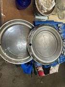 Tarps, auto trim items, and 2 DeSoto hubcaps