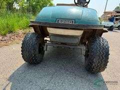 EZ-GO gas golf cart with dump box