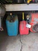 Vintage Kohler gas engine and 2 fuel cans