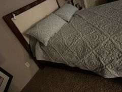 Queen size bed.  In basement bring help to load out.