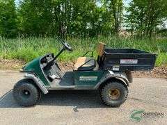 EZ-GO gas golf cart with dump box