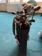 2 sets of rental clubs with bags