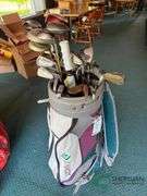 2 sets of rental clubs with bags