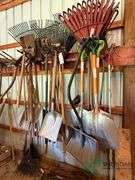Numerous rakes and shovels
