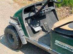 EZ-GO gas golf cart with dump box