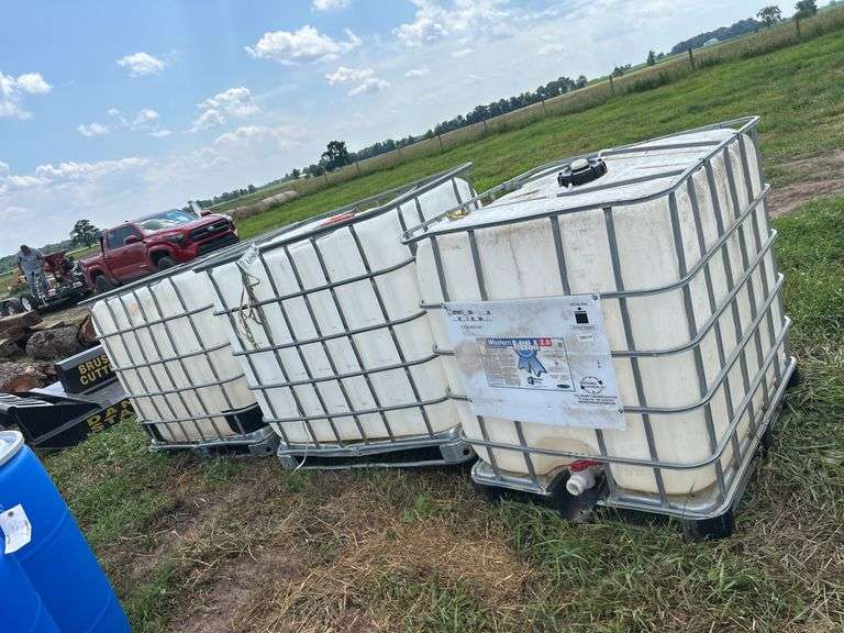 (3) Water totes, row:9 image