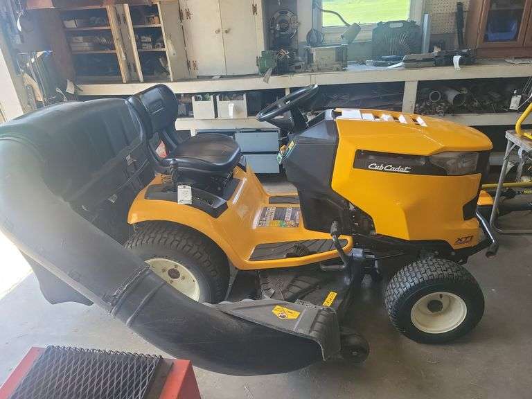 Cub Cadet XT1 riding lawn mower with clipping bagger
