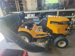 Cub Cadet XT1 riding lawn mower with clipping bagger