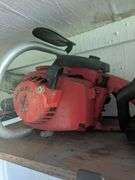 Red super X chainsaw