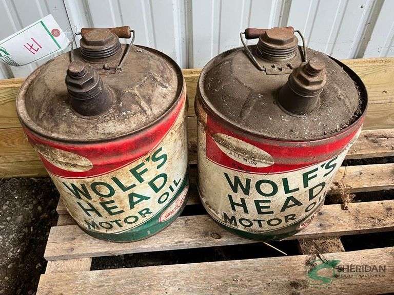 Pair of Vintage Wolf's Head Motor Oil Cans image