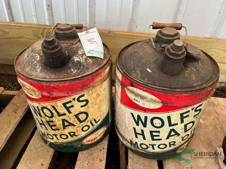 Pair of Vintage Wolf's Head Motor Oil Cans image