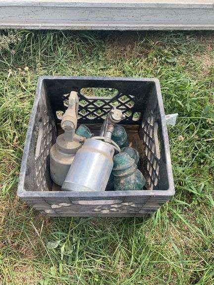 Crate of glass insulators & (2) paint guns, row:10 image