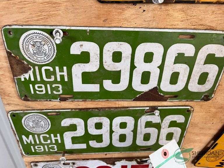 Vintage Michigan 1913 License Plates, metal and porcelain image
