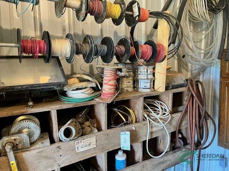Electrical wire and contents of wooden shelf image