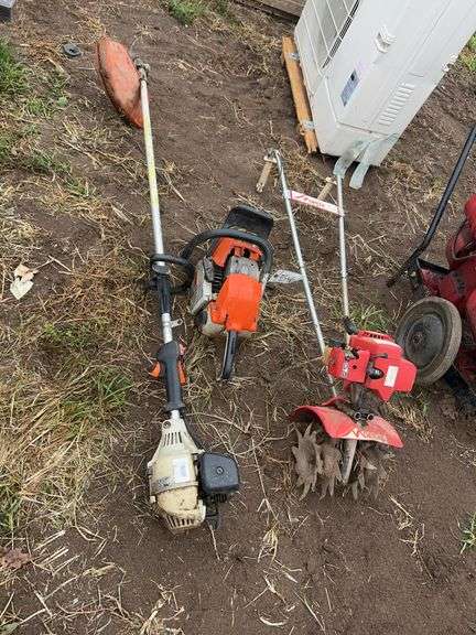 Lot of small equipment- chainsaw, weed whip, and rototiller, row:5 image