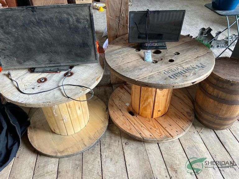 2 Wood spools, 2 computer/TV screens and vintage barrel image