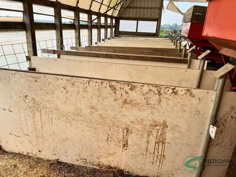 Homemade, metal and Poly calf pens in barn image