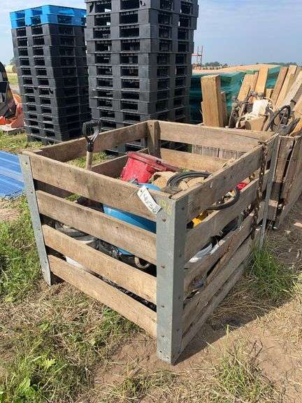 5 gallon buckets full of hydraulic oil in sockets, row:4 image