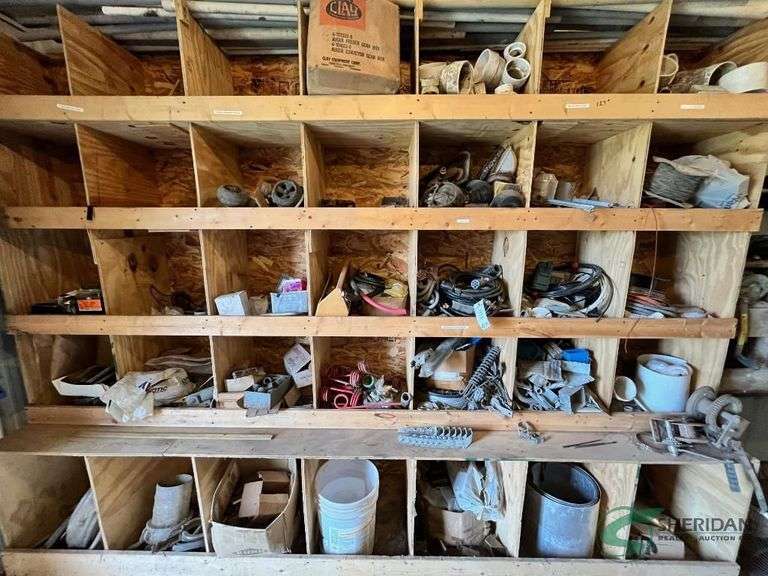 Contents of wooden storage shelf image