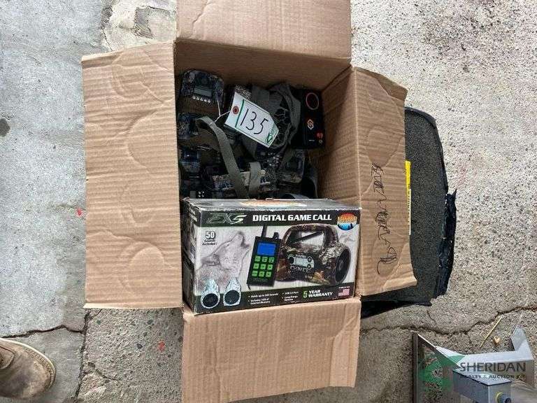 Numerous SIM card field cameras, target, and coyote call image