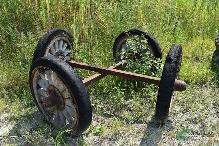 (2) axles with wood spoke wheels image