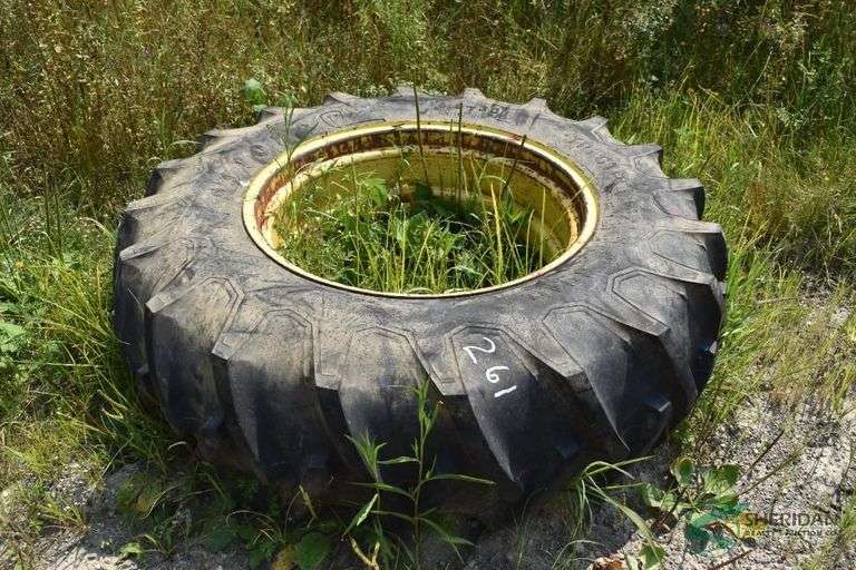 16.9-30 Tire on rim image