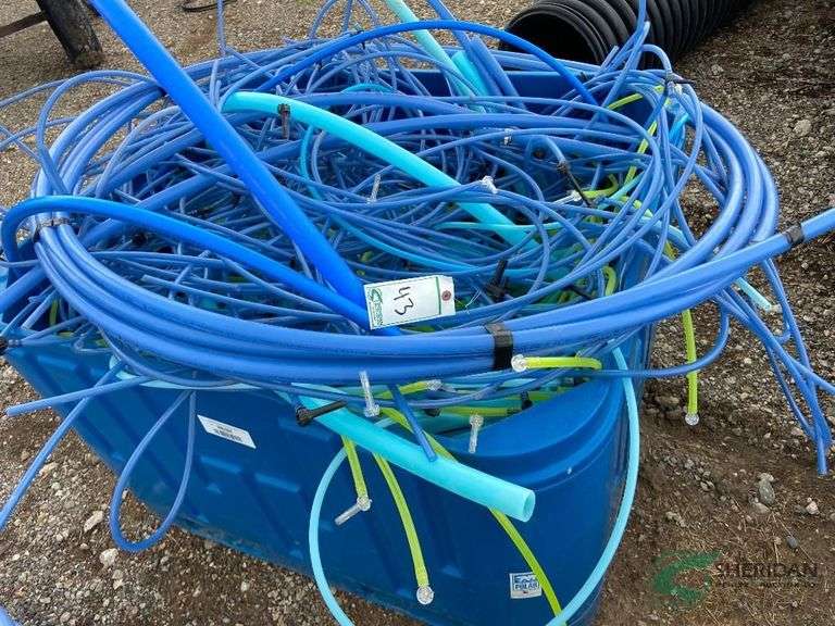 Bin with Misc. maple hose, fittings, and spiles image