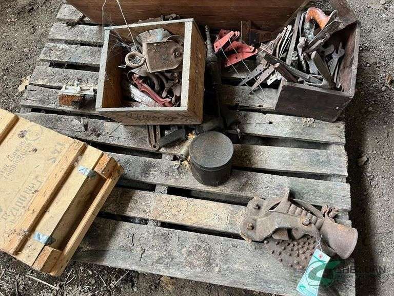 Various Primitive Items, corn sheller, gate hangers, hand tools, ammo box image