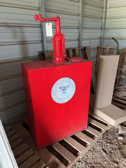 Vintage 50 gallon oil drum Texa-co, bldg:locked image