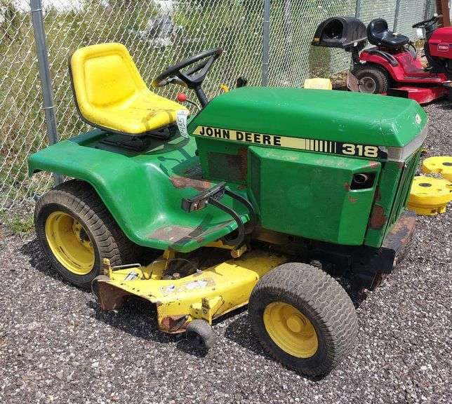 John Deere 318 Lawn Tractor w/ Snowblower & 4-Way Snow Plow image