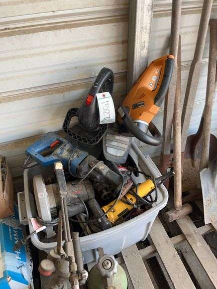 Full tote of power tools- drills, saws, etc. bldg:green image