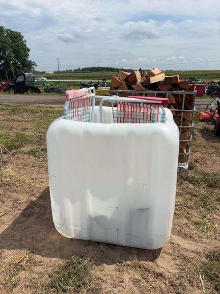 Plastic tote- chicken feeders, chicken waterers, & 2 benches, row:5 image