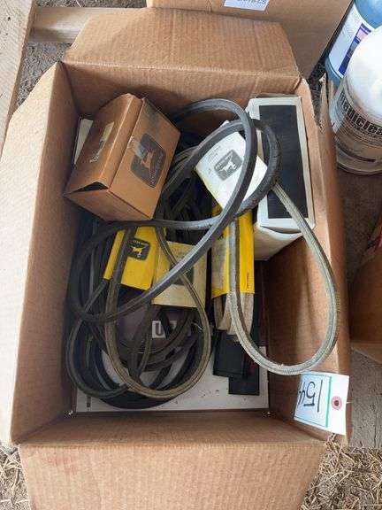 Box of John Deere mower parts, bldg:green image