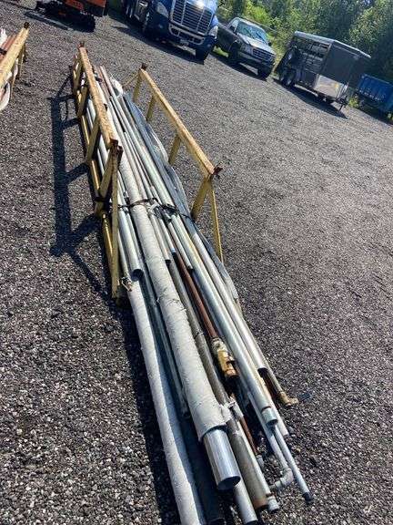 Rack of steel pipe, rod, and misc. stock