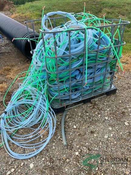 Crate with numerous Maple lines, fittings, and spiles image