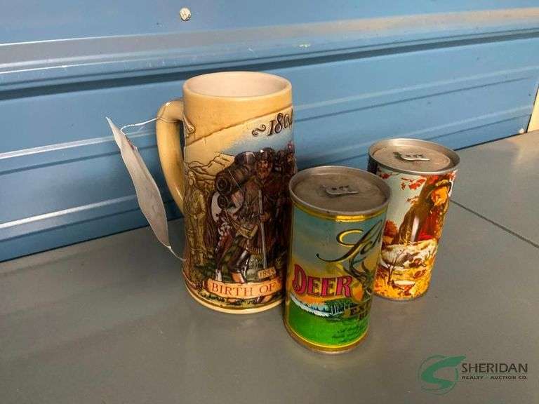 Beer stein and 2 vintage cans image