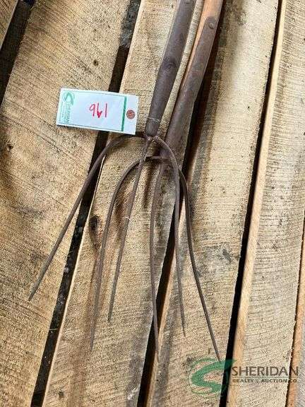 Pair of 3 tine pitch forks image