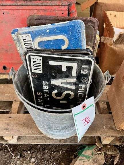 Bucket of Vintage Michigan License Plates, various image