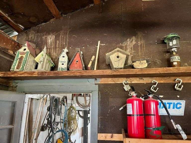 Bird Houses and Contents on shelf in garage image