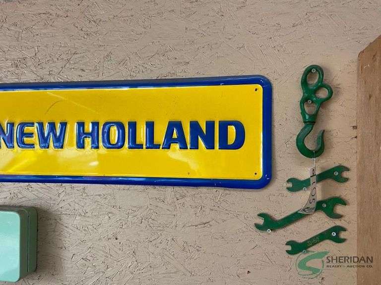 Vintage wrenches and New Holland sign image