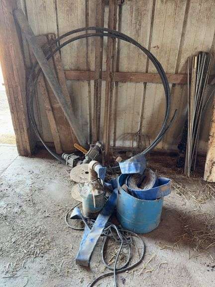 2inch electric pump with discharge hose, Banjo valve gates, partial roll of small cable, driveway markers and misc. image