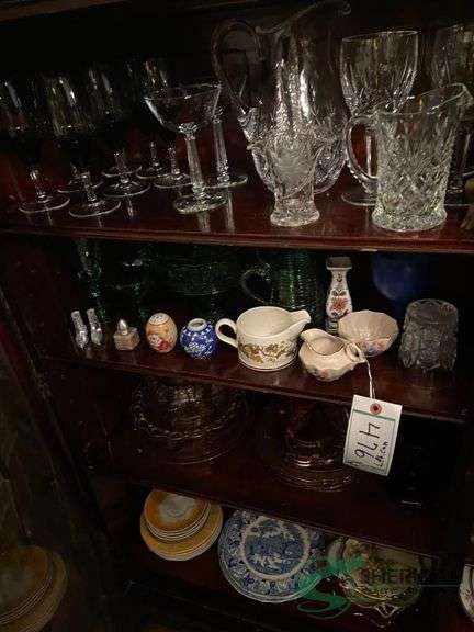 Contents of left side of China cabinet image