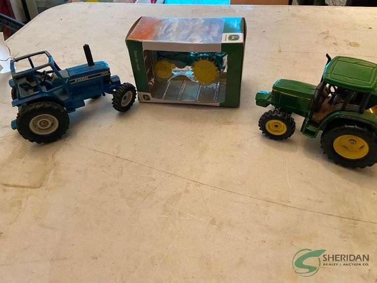 (3) Toy tractors image