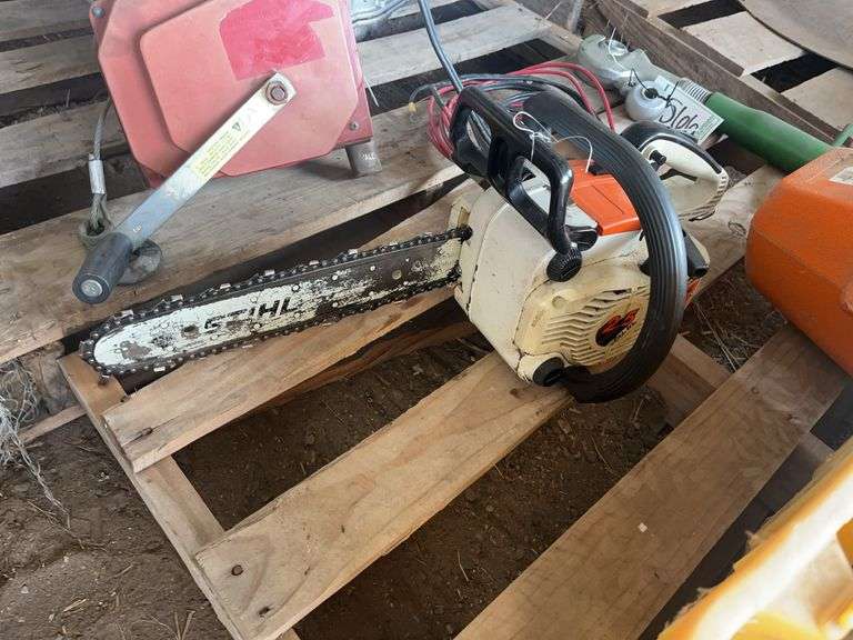 Stihl top handle chain saw, bldg:green image