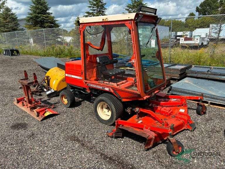 2002 Kubota F2000 mower, plow, and broom included image