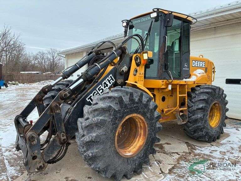 John Deere TC54H Pay Loader showing 14447 hours image